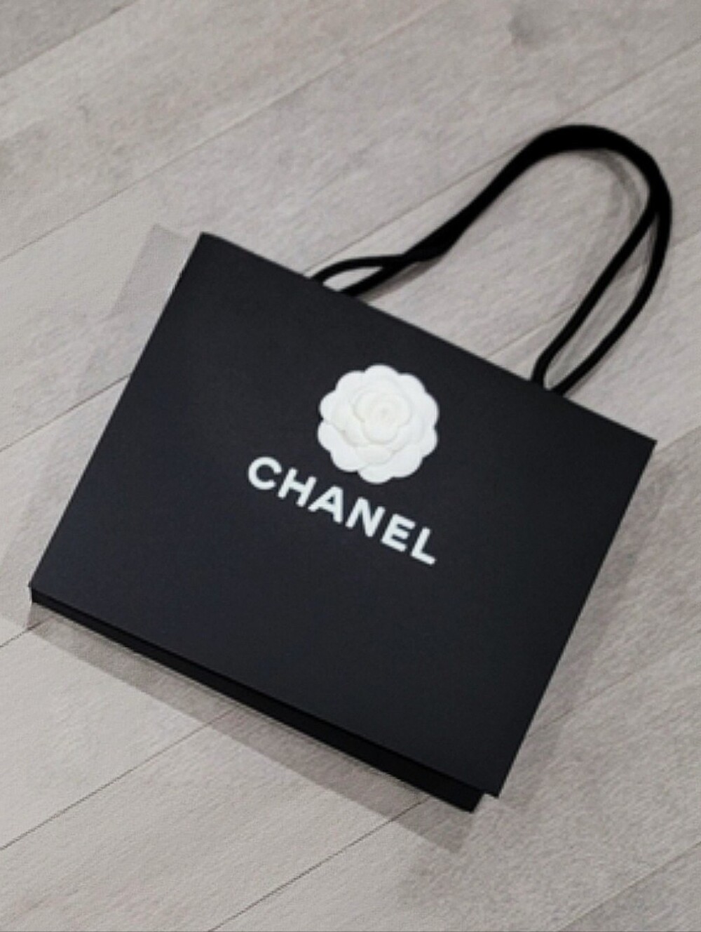 CHANEL Black Shopping Bag With White Camellia